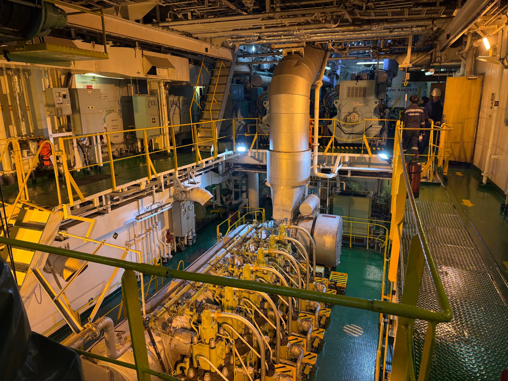 Engine room overview aboard a vessel