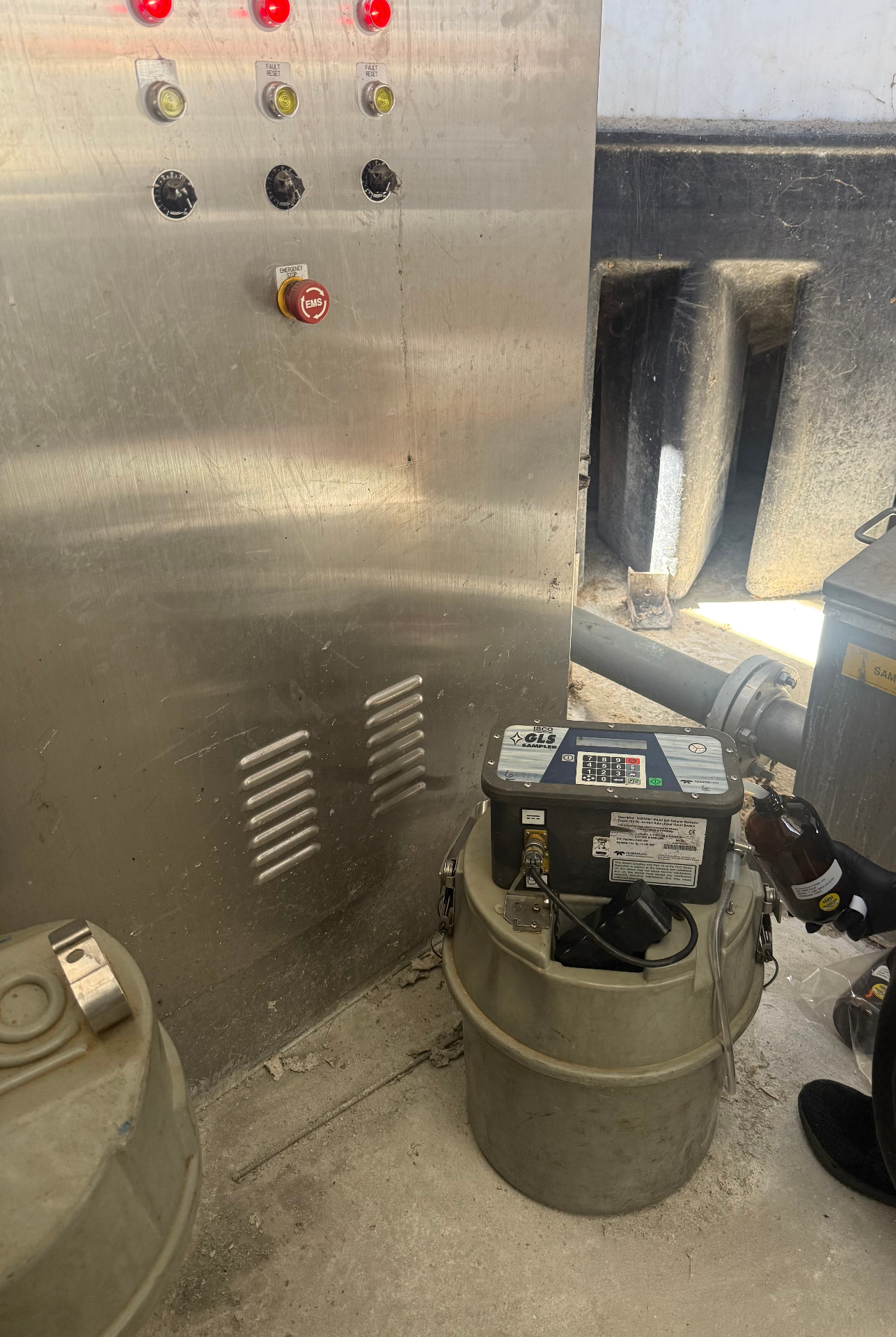 ISCO composite sampler staged inside a permitted discharge vault.